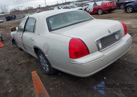 2004 Lincoln Town Car Ultimate из США, поврежденный, VIN 1LNHM83W04Y667787